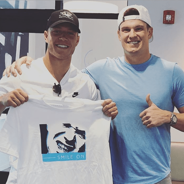 Christian McCaffrey of the Carolina Panthers and orthodontist Dr. Matt Lineberger in Charlotte, Huntersville, and Mooresville
